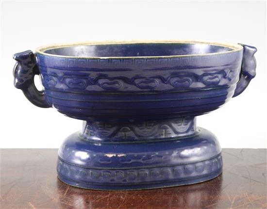A Chinese Imperial blue glazed ritual offering vessel (gui), moulded Qianlong seal mark and of the period (1736-95), 28.5cm wide
